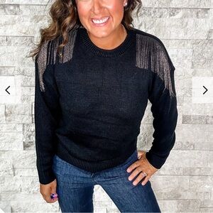 Boutique Black Crew Neck Sweater with Sheer Shoulder Detail and metal fringe